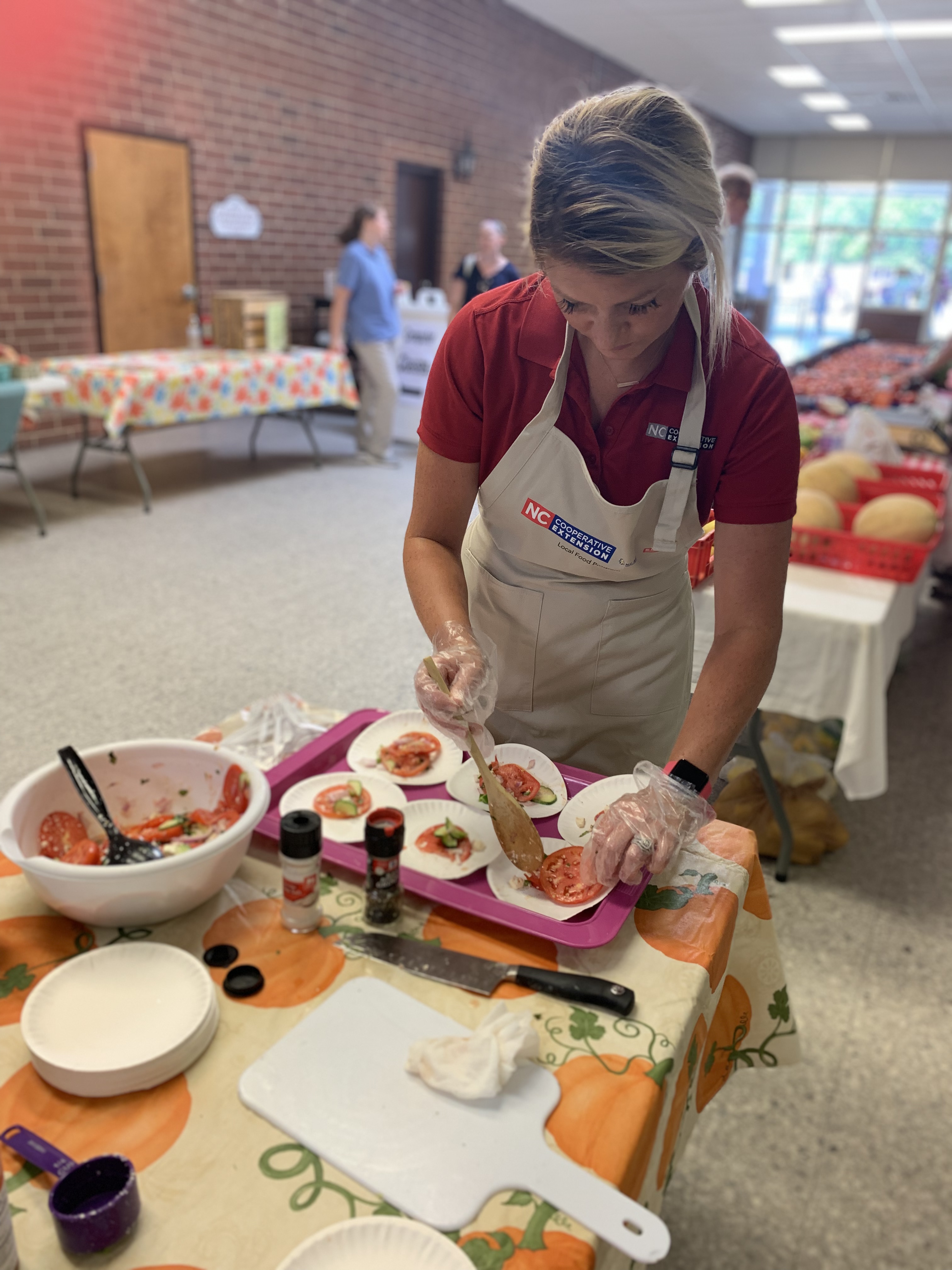FCS Agent serves samples as part of a local food demonstration