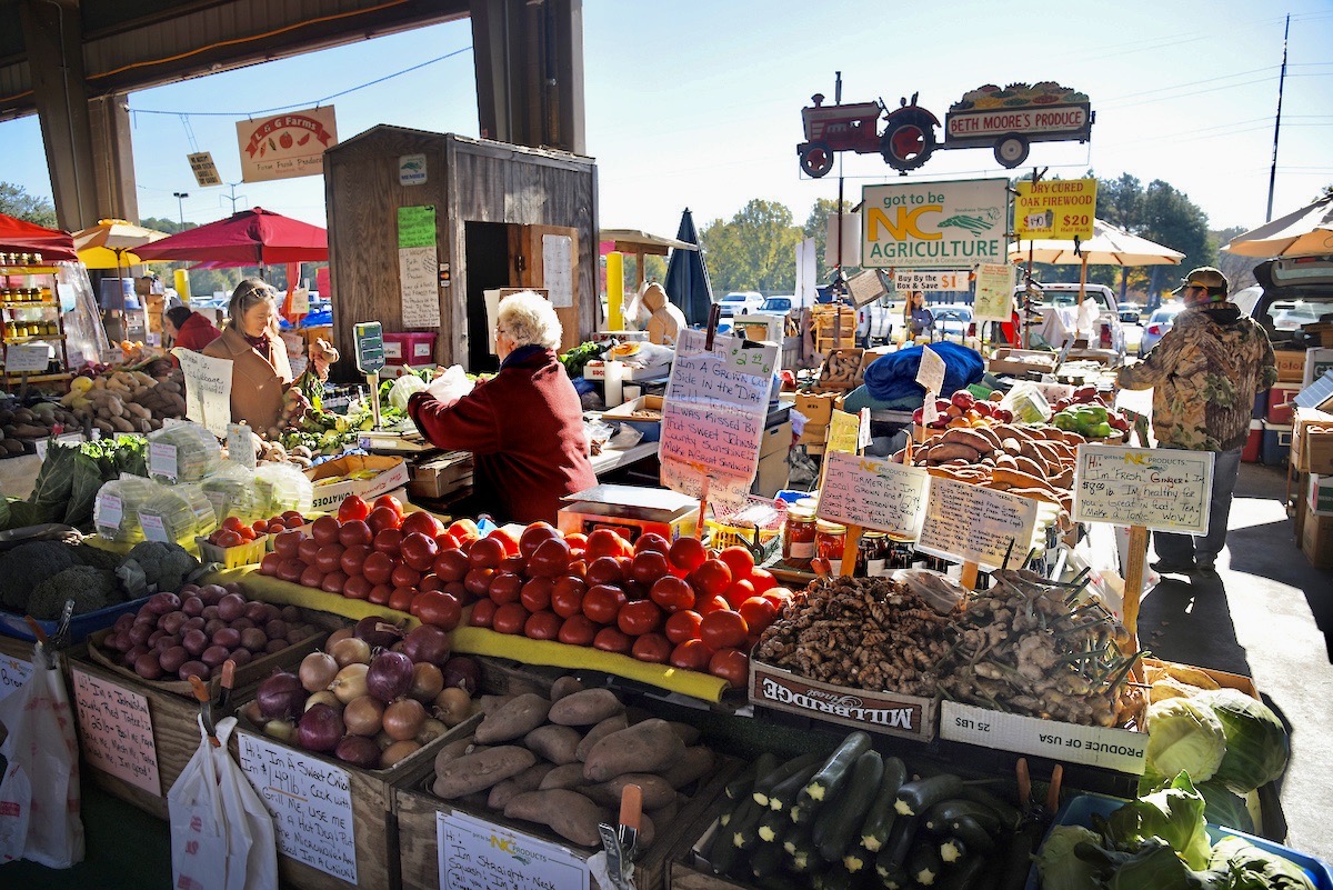 Fresh produce available at the North Carolina State Farmers' Market on a fall day.