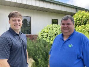 Two men looking at camera