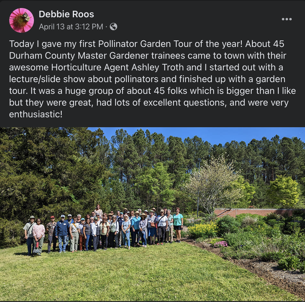 Debbie Roos giving a tour of the pollinator garden.